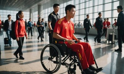 pemain China kembali menggunakan kursi roda